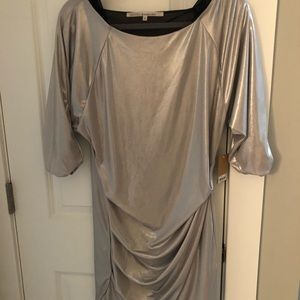 Awesome silver off the shoulder dress.